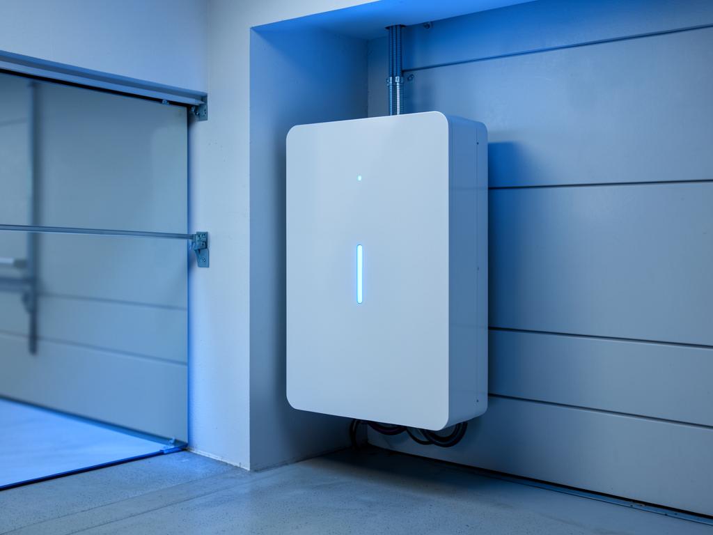 Home battery storage unit fitted in a garage